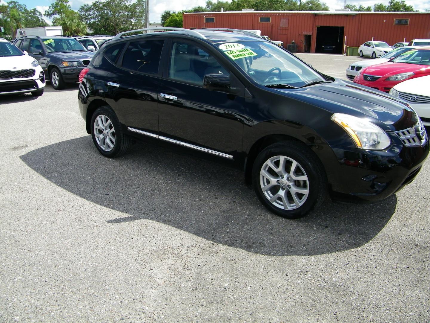 2012 Black /Tan Nissan Rogue S FWD Krom Edition (JN8AS5MT2CW) with an 2.5L L4 DOHC 16V engine, Continuously Variable Transmission transmission, located at 4000 Bee Ridge Road, Sarasota, FL, 34233, (941) 926-0300, 27.298664, -82.489151 - Photo#7