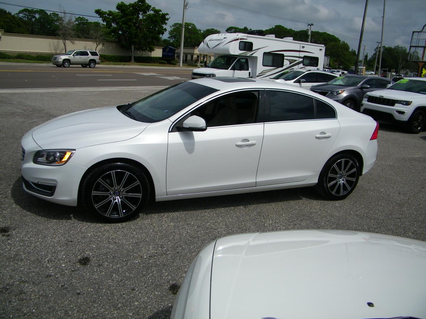 2017 /Black Volvo S60 T5 Inscription AWD (LYV402TK8HB) with an 2.0L L4 DOHC 16V engine, 8A transmission, located at 4000 Bee Ridge Road, Sarasota, FL, 34233, (941) 926-0300, 27.298664, -82.489151 - Photo#2