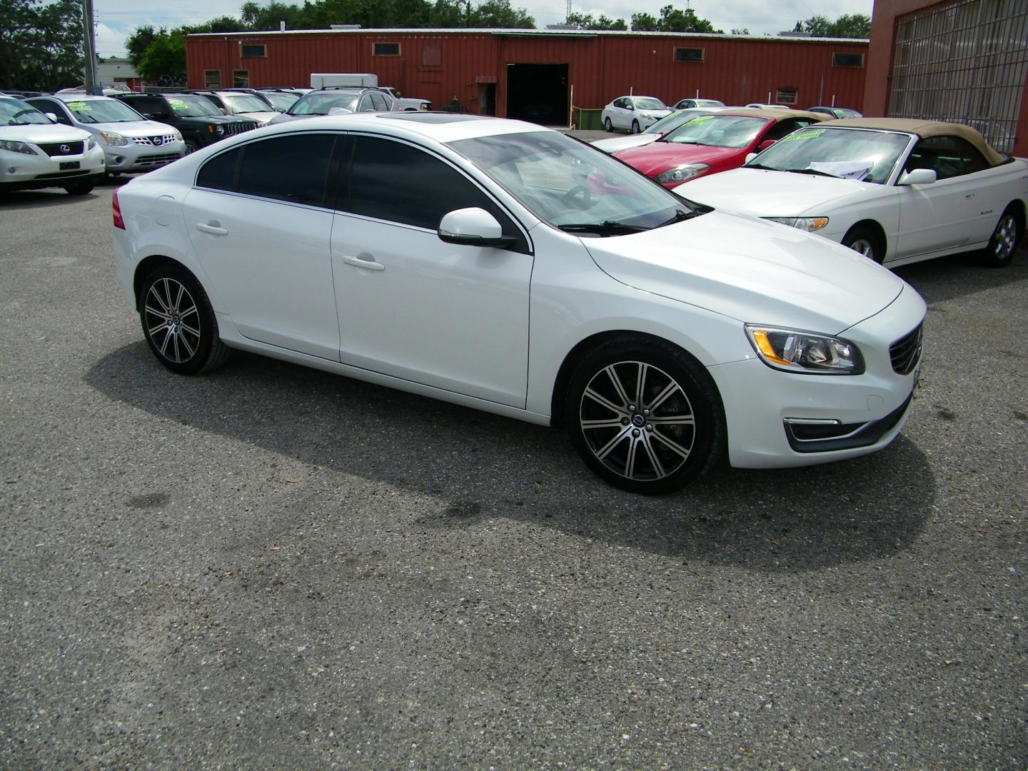 2017 /Black Volvo S60 T5 Inscription AWD (LYV402TK8HB) with an 2.0L L4 DOHC 16V engine, 8A transmission, located at 4000 Bee Ridge Road, Sarasota, FL, 34233, (941) 926-0300, 27.298664, -82.489151 - Photo#7