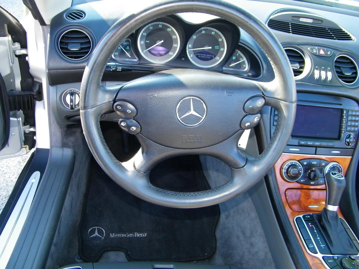 2005 Silver /Black Mercedes-Benz SL-Class SL500 (WDBSK75F05F) with an 5.0L V8 DOHC 32V engine, 7-Speed Automatic Overdrive transmission, located at 4000 Bee Ridge Road, Sarasota, FL, 34233, (941) 926-0300, 27.298664, -82.489151 - Photo#18