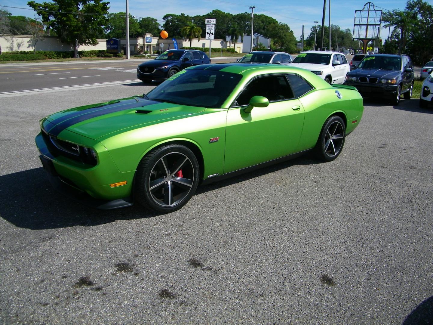 2011 Green /Black Dodge Challenger SRT8 (2B3CJ7DJ9BH) with an 6.4L V8 OHV 16V engine, 5-Speed Automatic transmission, located at 4000 Bee Ridge Road, Sarasota, FL, 34233, (941) 926-0300, 27.298664, -82.489151 - Photo#0