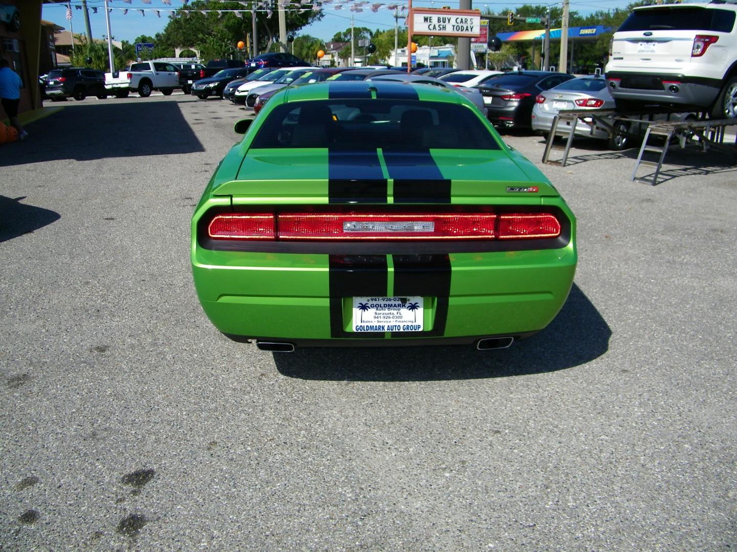 2011 Green /Black Dodge Challenger SRT8 (2B3CJ7DJ9BH) with an 6.4L V8 OHV 16V engine, 5-Speed Automatic transmission, located at 4000 Bee Ridge Road, Sarasota, FL, 34233, (941) 926-0300, 27.298664, -82.489151 - Photo#4