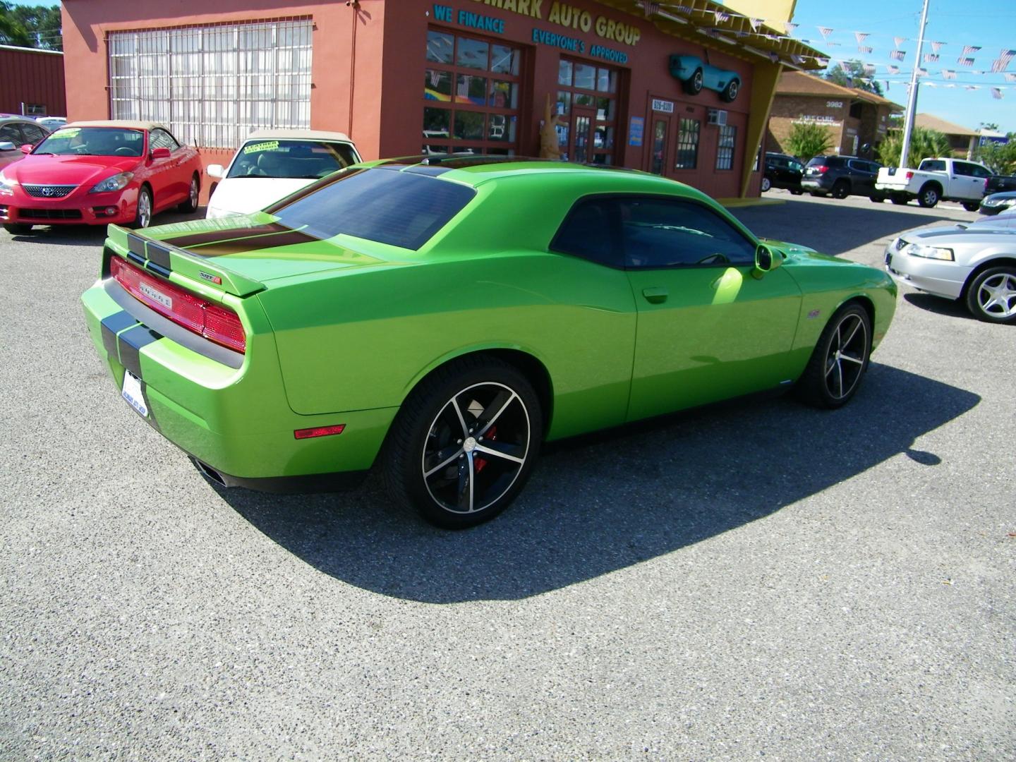 2011 Green /Black Dodge Challenger SRT8 (2B3CJ7DJ9BH) with an 6.4L V8 OHV 16V engine, 5-Speed Automatic transmission, located at 4000 Bee Ridge Road, Sarasota, FL, 34233, (941) 926-0300, 27.298664, -82.489151 - Photo#5