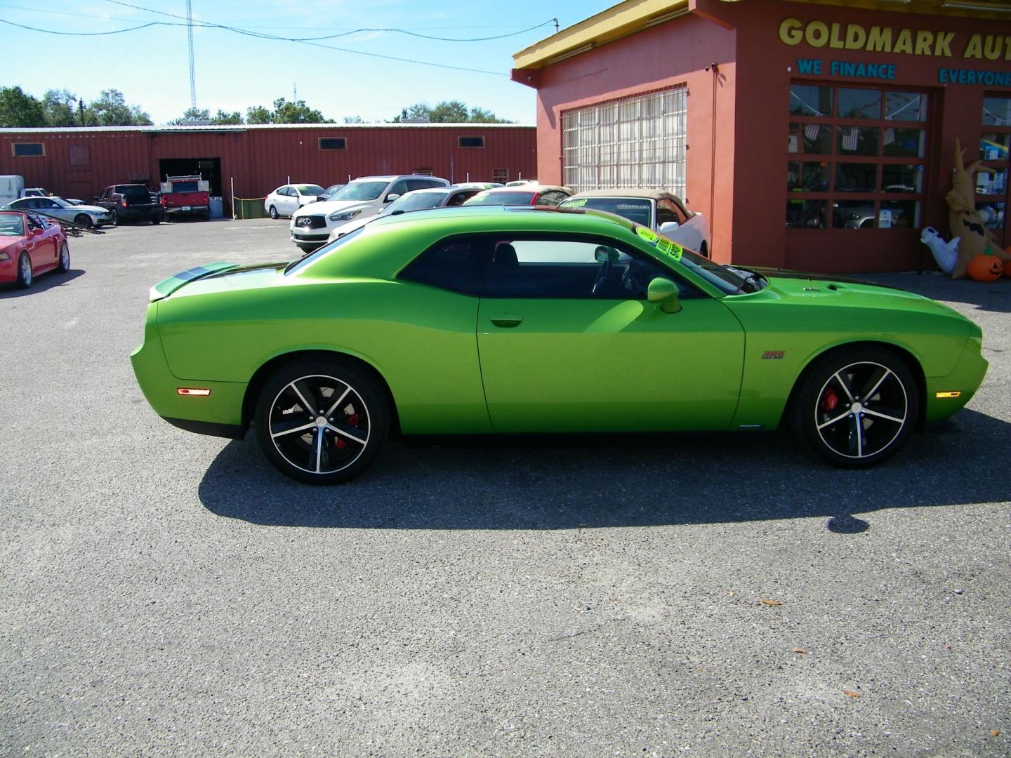 2011 Green /Black Dodge Challenger SRT8 (2B3CJ7DJ9BH) with an 6.4L V8 OHV 16V engine, 5-Speed Automatic transmission, located at 4000 Bee Ridge Road, Sarasota, FL, 34233, (941) 926-0300, 27.298664, -82.489151 - Photo#6