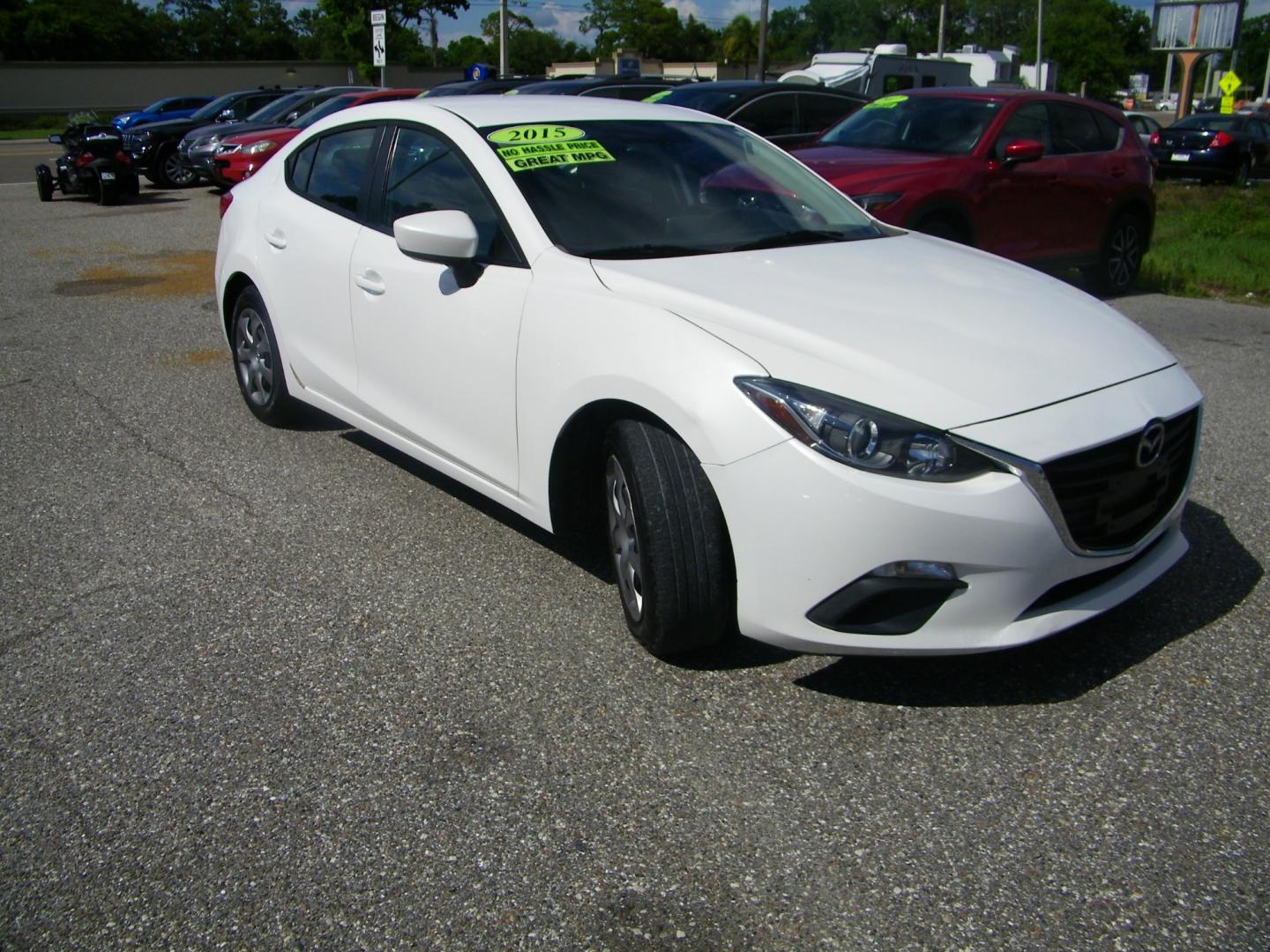 2015 White /Beige Mazda MAZDA3 iSport (3MZBM1U79FM) with an 2.0L I4 engine, Automatic transmission, located at 4000 Bee Ridge Road, Sarasota, FL, 34233, (941) 926-0300, 27.298664, -82.489151 - Photo#3