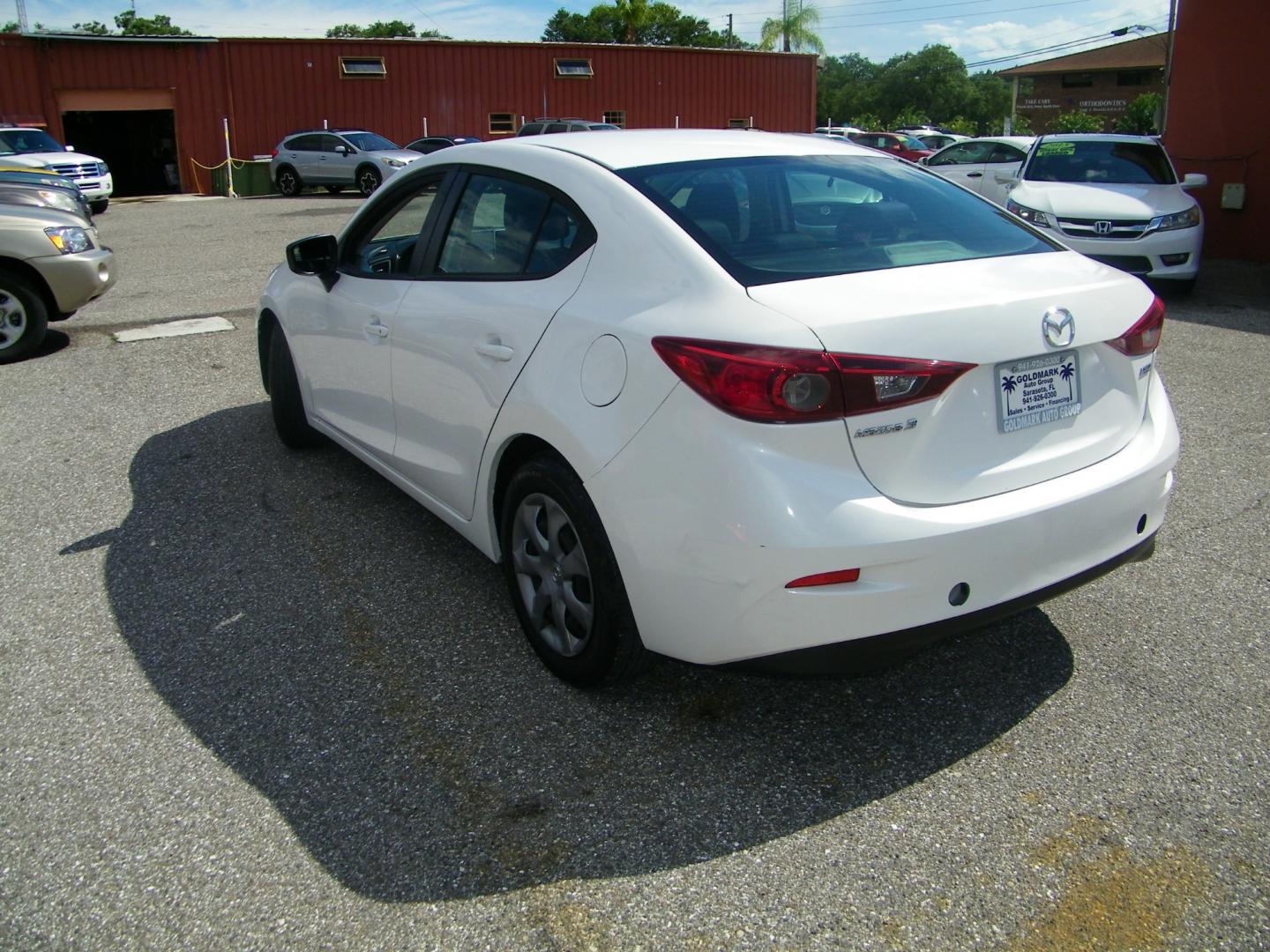 2015 White /Beige Mazda MAZDA3 iSport (3MZBM1U79FM) with an 2.0L I4 engine, Automatic transmission, located at 4000 Bee Ridge Road, Sarasota, FL, 34233, (941) 926-0300, 27.298664, -82.489151 - Photo#5