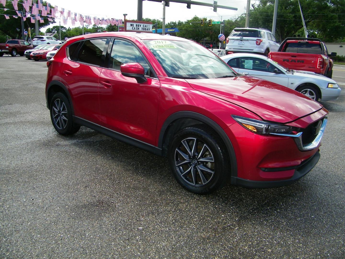 2017 Red /Beige Mazda CX-5 Grand Touring (JM3KFADL4H0) with an 2.5L I4 engine, Automatic transmission, located at 4000 Bee Ridge Road, Sarasota, FL, 34233, (941) 926-0300, 27.298664, -82.489151 - Photo#0