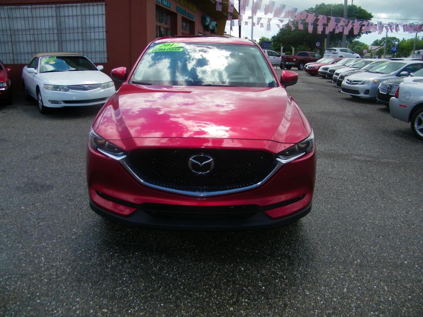 2017 Red /Beige Mazda CX-5 Grand Touring (JM3KFADL4H0) with an 2.5L I4 engine, Automatic transmission, located at 4000 Bee Ridge Road, Sarasota, FL, 34233, (941) 926-0300, 27.298664, -82.489151 - Photo#2