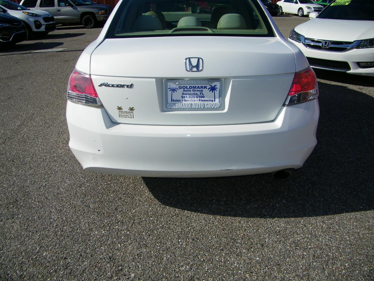 2009 White /Tan Honda Accord EX Sedan AT (1HGCP26769A) with an 2.4L L4 DOHC 16V engine, 5-Speed Automatic transmission, located at 4000 Bee Ridge Road, Sarasota, FL, 34233, (941) 926-0300, 27.298664, -82.489151 - Photo#4