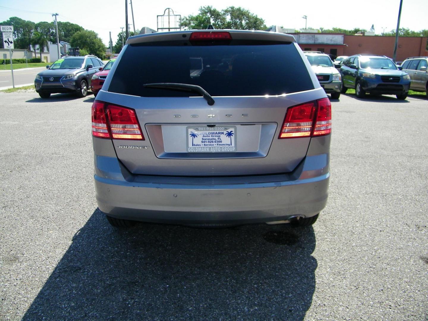 2020 /Black Dodge Journey SE Value (3C4PDCAB1LT) with an 2.4L L4 DOHC 16V engine, 6A transmission, located at 4000 Bee Ridge Road, Sarasota, FL, 34233, (941) 926-0300, 27.298664, -82.489151 - Photo#3