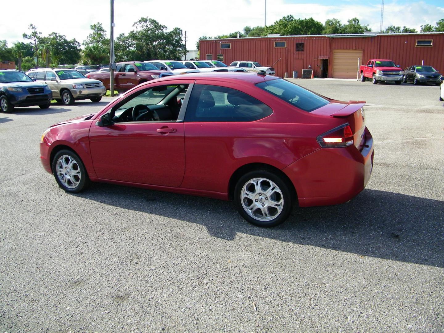 2010 /Black Ford Focus SE Coupe (1FAHP3CN2AW) with an 2.0L L4 DOHC 16V engine, located at 4000 Bee Ridge Road, Sarasota, FL, 34233, (941) 926-0300, 27.298664, -82.489151 - Photo#3