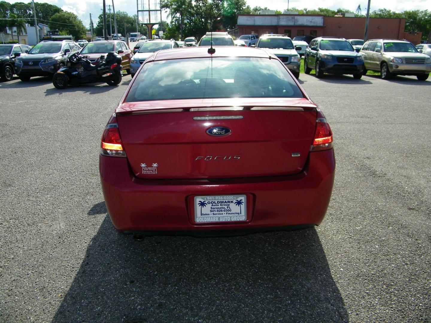 2010 /Black Ford Focus SE Coupe (1FAHP3CN2AW) with an 2.0L L4 DOHC 16V engine, located at 4000 Bee Ridge Road, Sarasota, FL, 34233, (941) 926-0300, 27.298664, -82.489151 - Photo#4