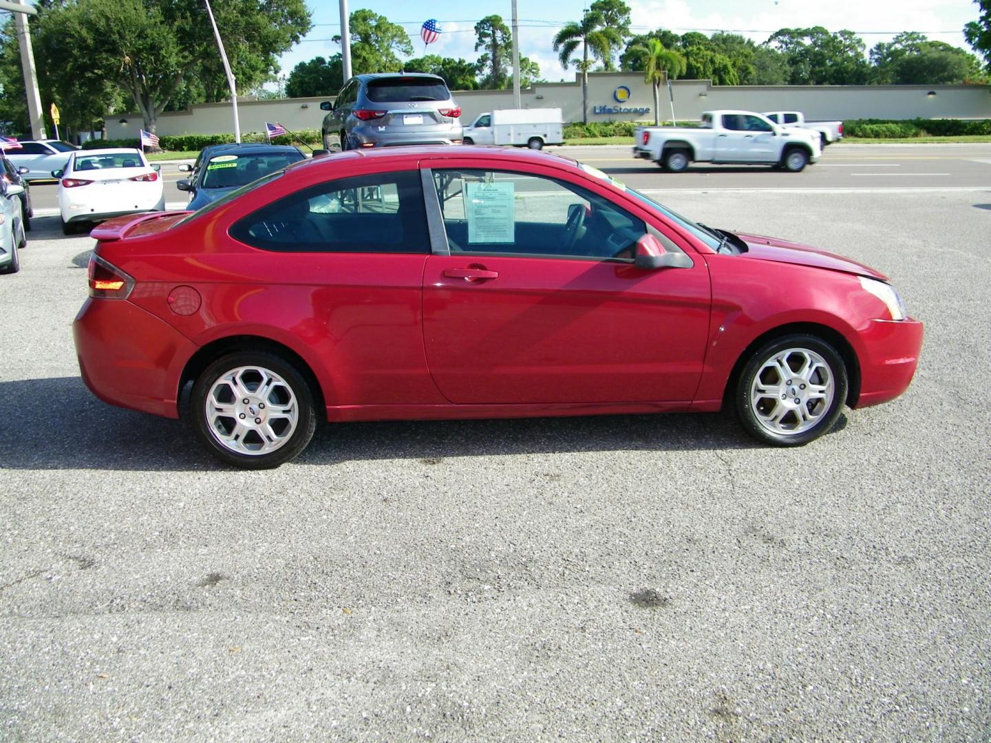 2010 /Black Ford Focus SE Coupe (1FAHP3CN2AW) with an 2.0L L4 DOHC 16V engine, located at 4000 Bee Ridge Road, Sarasota, FL, 34233, (941) 926-0300, 27.298664, -82.489151 - Photo#8