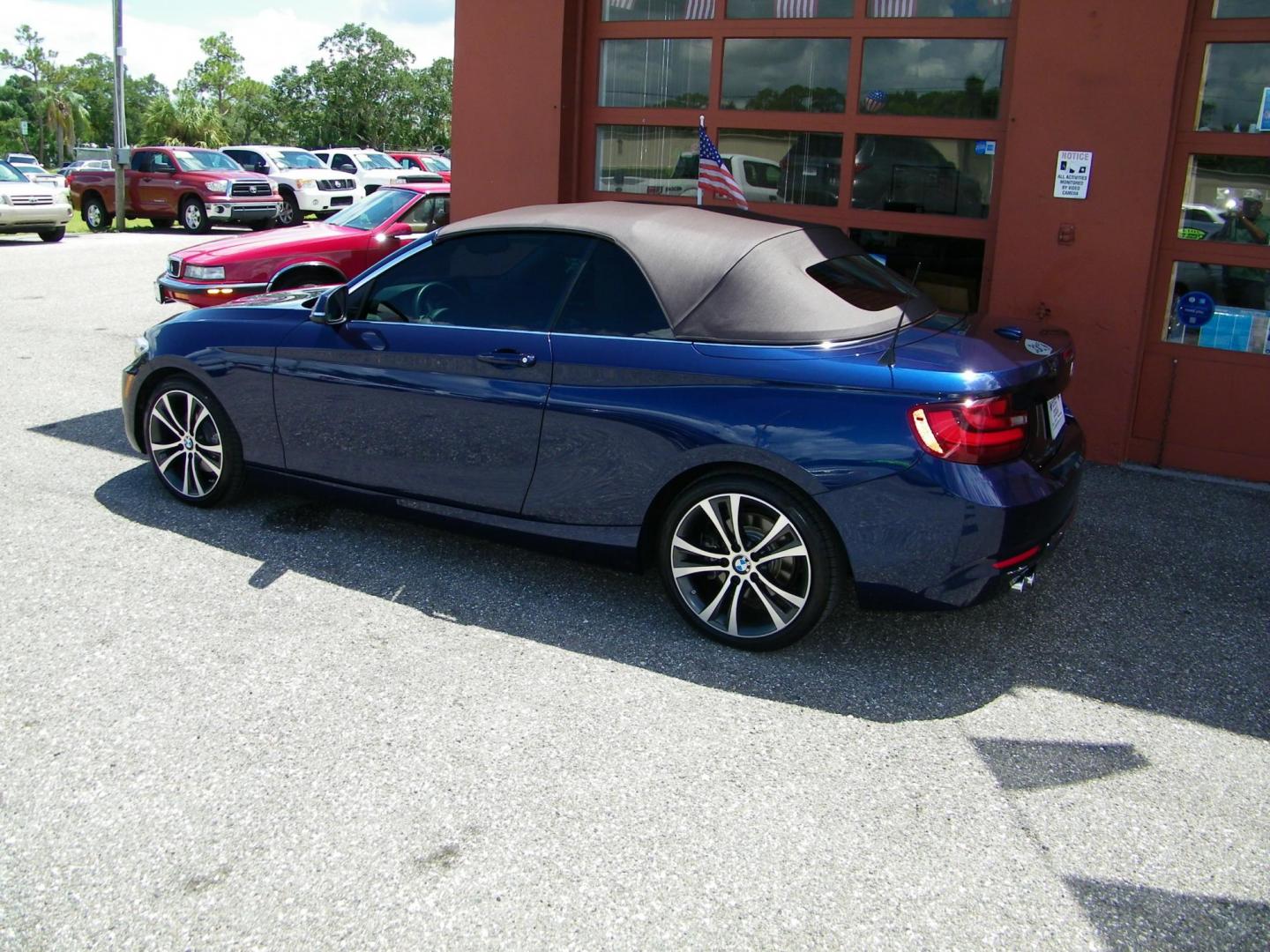 2016 /Beige BMW 2-Series 228i Convertible (WBA1K9C52GV) with an 2.0L L4 DOHC 16V engine, 8A transmission, located at 4000 Bee Ridge Road, Sarasota, FL, 34233, (941) 926-0300, 27.298664, -82.489151 - Photo#3