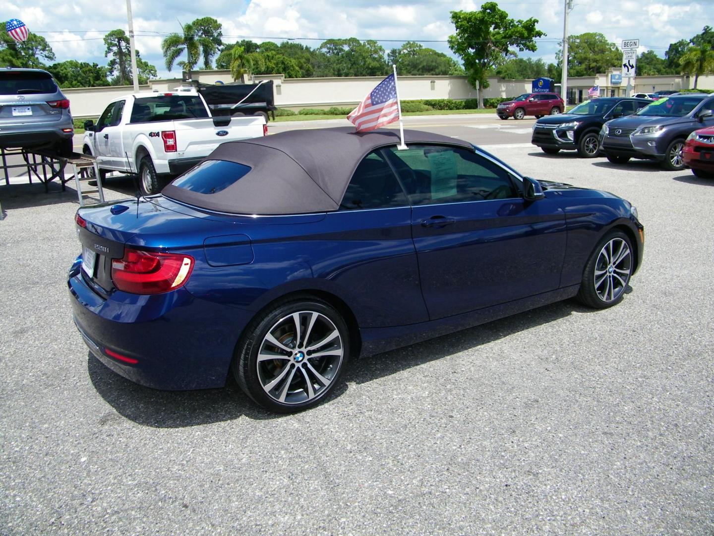 2016 /Beige BMW 2-Series 228i Convertible (WBA1K9C52GV) with an 2.0L L4 DOHC 16V engine, 8A transmission, located at 4000 Bee Ridge Road, Sarasota, FL, 34233, (941) 926-0300, 27.298664, -82.489151 - Photo#5