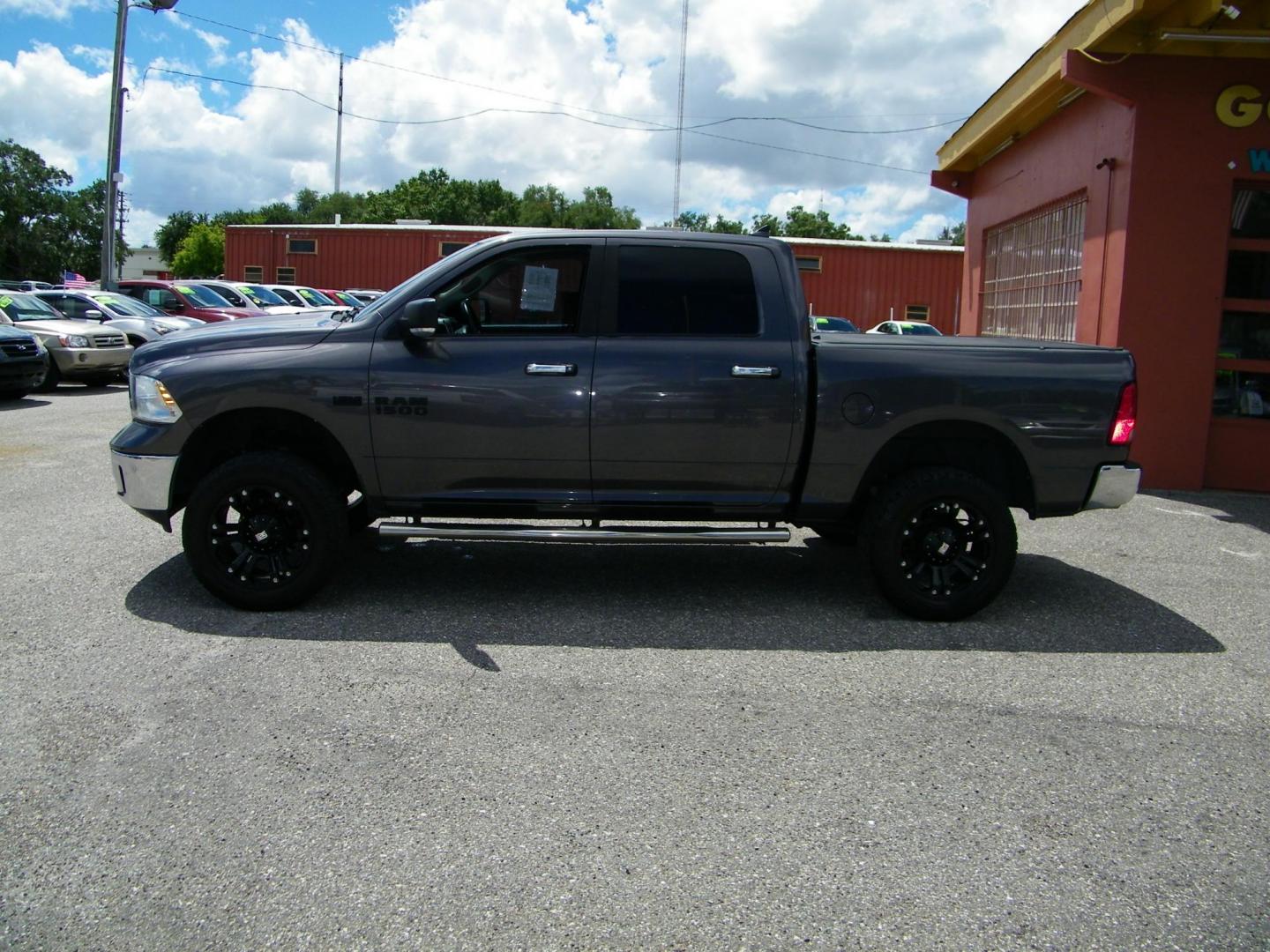 2016 /Black RAM 1500 SLT Crew Cab SWB 2WD (1C6RR6LT5GS) with an 5.7L V8 OHV 16V engine, 6A transmission, located at 4000 Bee Ridge Road, Sarasota, FL, 34233, (941) 926-0300, 27.298664, -82.489151 - Photo#1