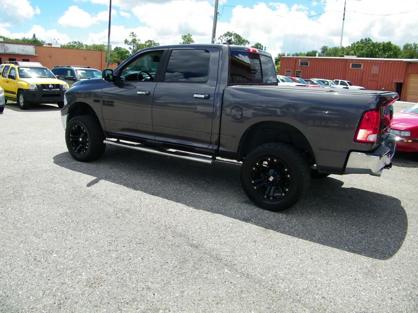 2016 /Black RAM 1500 SLT Crew Cab SWB 2WD (1C6RR6LT5GS) with an 5.7L V8 OHV 16V engine, 6A transmission, located at 4000 Bee Ridge Road, Sarasota, FL, 34233, (941) 926-0300, 27.298664, -82.489151 - Photo#2