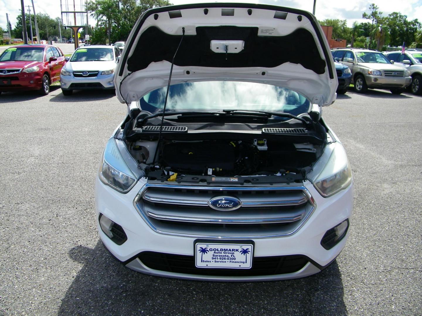 2017 /Grey Ford Escape SE FWD (1FMCU0GD0HU) with an 1.5L L4 DOHC 16V engine, 6A transmission, located at 4000 Bee Ridge Road, Sarasota, FL, 34233, (941) 926-0300, 27.298664, -82.489151 - Photo#7