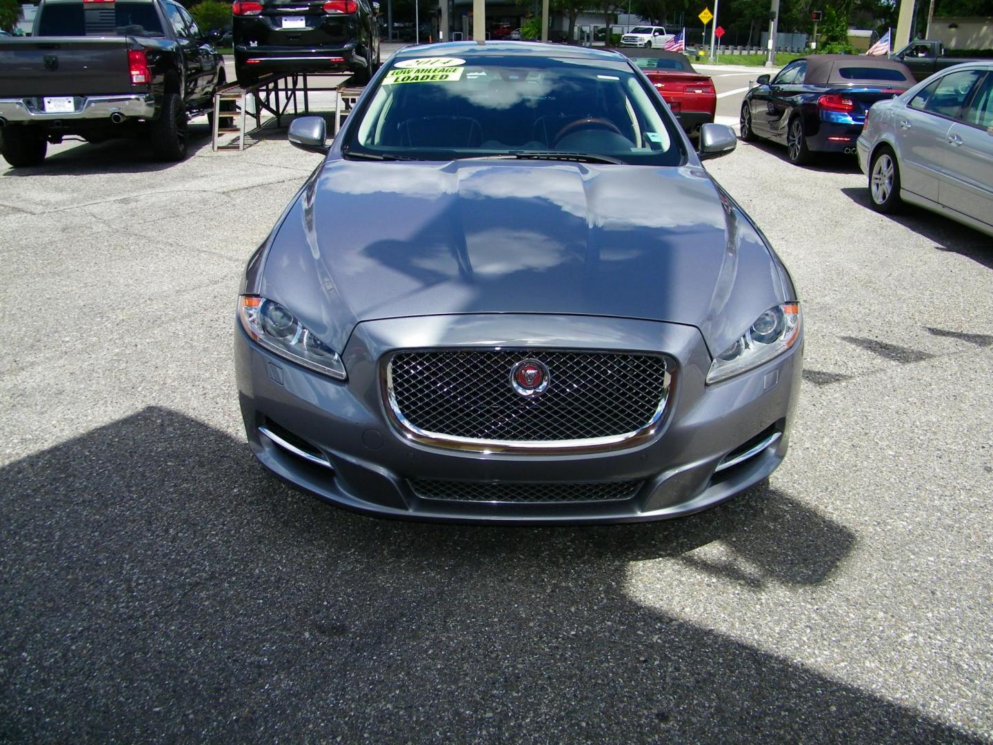 2014 /Black Jaguar XJ-Series XJL Portfolio (SAJWA2GZXE8) with an 3.0L V6 DOHC 24V FFV engine, 8-Speed Automatic transmission, located at 4000 Bee Ridge Road, Sarasota, FL, 34233, (941) 926-0300, 27.298664, -82.489151 - Photo#2