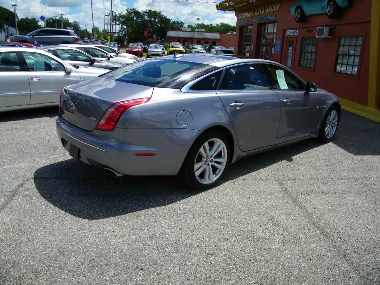 2014 /Black Jaguar XJ-Series XJL Portfolio (SAJWA2GZXE8) with an 3.0L V6 DOHC 24V FFV engine, 8-Speed Automatic transmission, located at 4000 Bee Ridge Road, Sarasota, FL, 34233, (941) 926-0300, 27.298664, -82.489151 - Photo#5