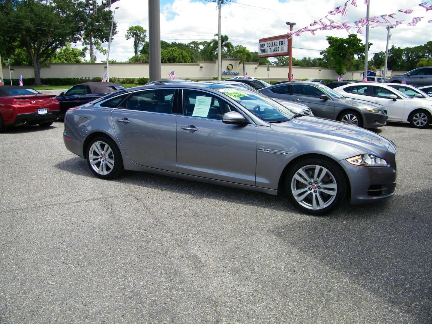 2014 /Black Jaguar XJ-Series XJL Portfolio (SAJWA2GZXE8) with an 3.0L V6 DOHC 24V FFV engine, 8-Speed Automatic transmission, located at 4000 Bee Ridge Road, Sarasota, FL, 34233, (941) 926-0300, 27.298664, -82.489151 - Photo#6