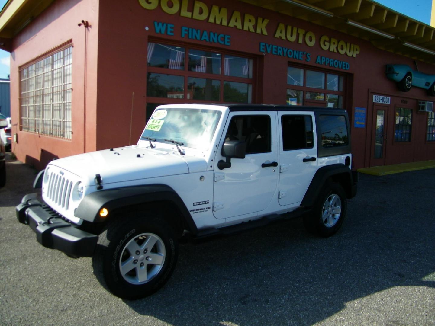 2015 White /Black Jeep Wrangler Unlimited Sport 4WD (1C4BJWDG4FL) with an 3.6L V6 DOHC 24V FFV engine, Automatic transmission, located at 4000 Bee Ridge Road, Sarasota, FL, 34233, (941) 926-0300, 27.298664, -82.489151 - Photo#0