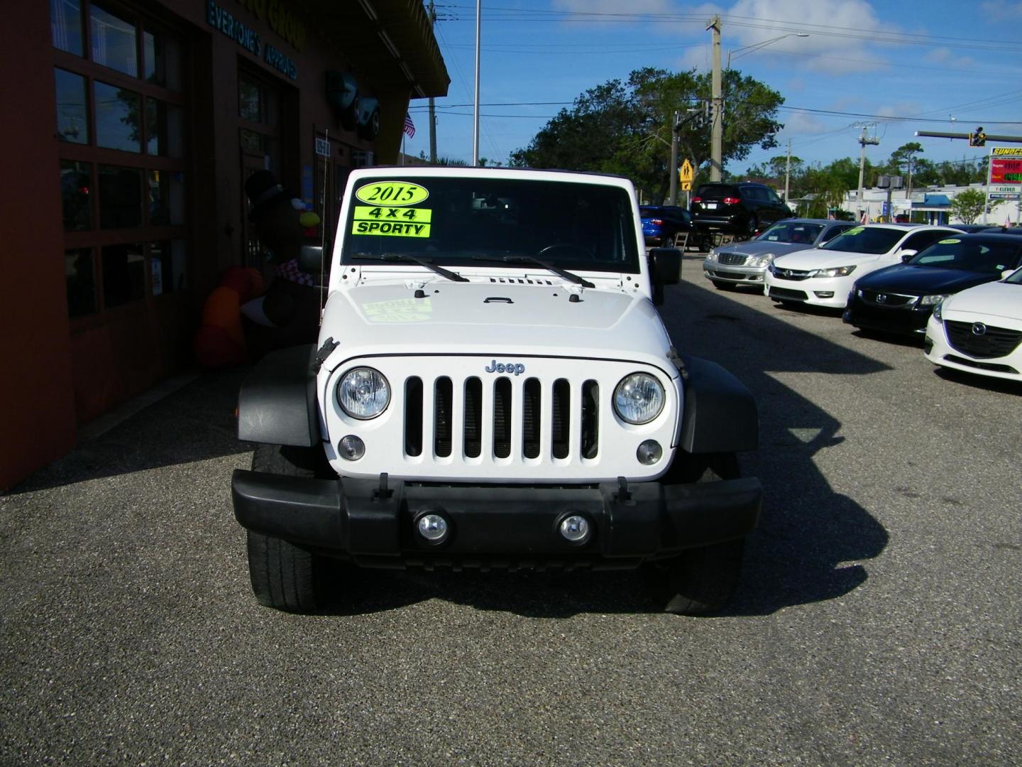 2015 White /Black Jeep Wrangler Unlimited Sport 4WD (1C4BJWDG4FL) with an 3.6L V6 DOHC 24V FFV engine, Automatic transmission, located at 4000 Bee Ridge Road, Sarasota, FL, 34233, (941) 926-0300, 27.298664, -82.489151 - Photo#1