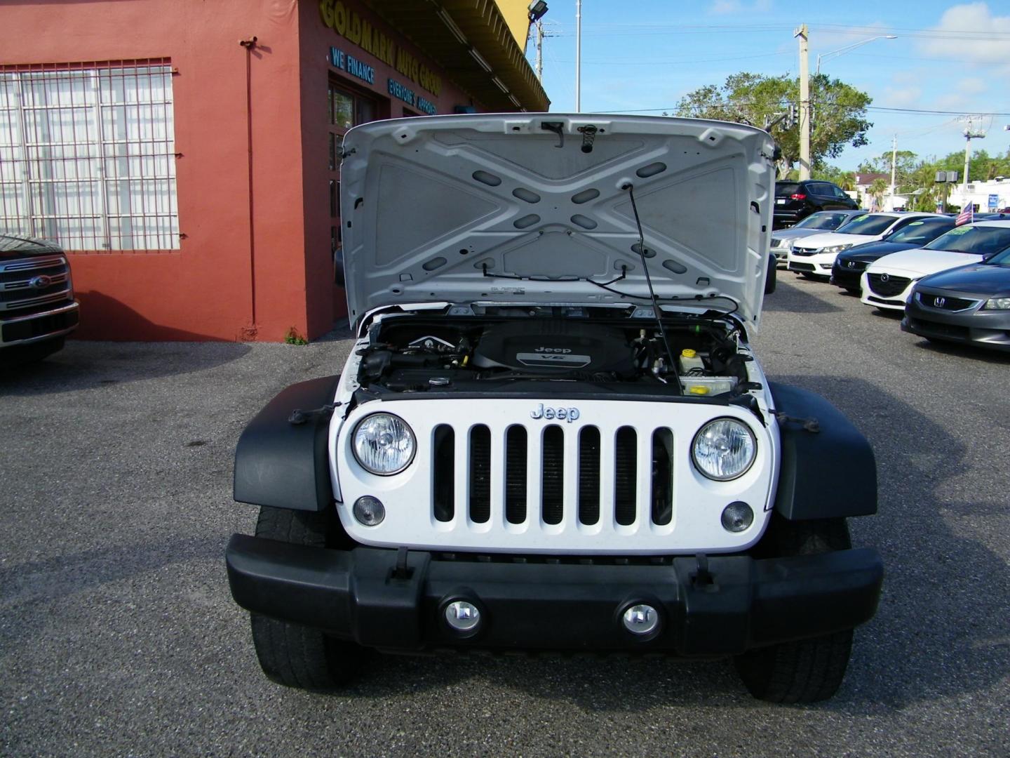 2015 White /Black Jeep Wrangler Unlimited Sport 4WD (1C4BJWDG4FL) with an 3.6L V6 DOHC 24V FFV engine, Automatic transmission, located at 4000 Bee Ridge Road, Sarasota, FL, 34233, (941) 926-0300, 27.298664, -82.489151 - Photo#10