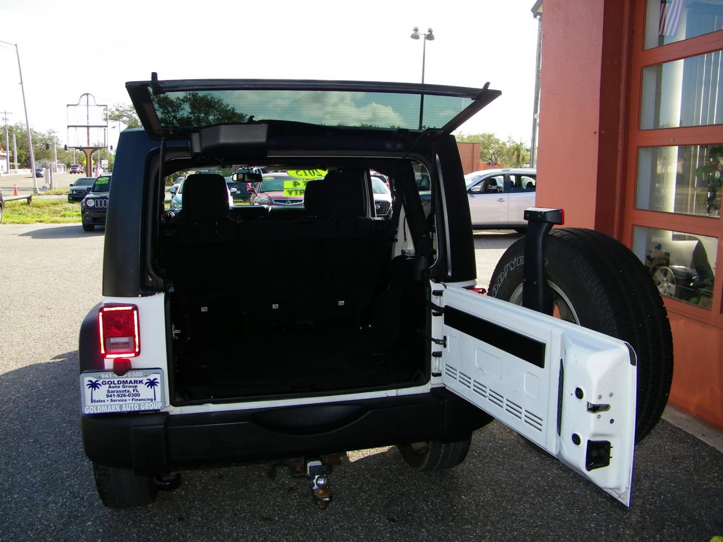 2015 White /Black Jeep Wrangler Unlimited Sport 4WD (1C4BJWDG4FL) with an 3.6L V6 DOHC 24V FFV engine, Automatic transmission, located at 4000 Bee Ridge Road, Sarasota, FL, 34233, (941) 926-0300, 27.298664, -82.489151 - Photo#5