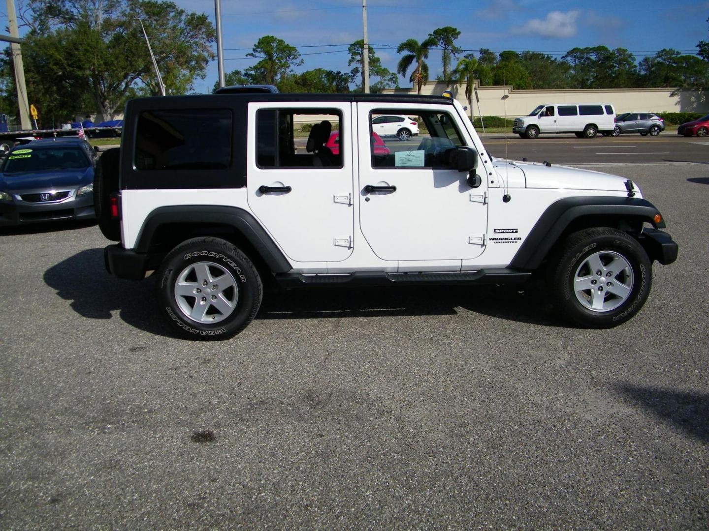 2015 White /Black Jeep Wrangler Unlimited Sport 4WD (1C4BJWDG4FL) with an 3.6L V6 DOHC 24V FFV engine, Automatic transmission, located at 4000 Bee Ridge Road, Sarasota, FL, 34233, (941) 926-0300, 27.298664, -82.489151 - Photo#9