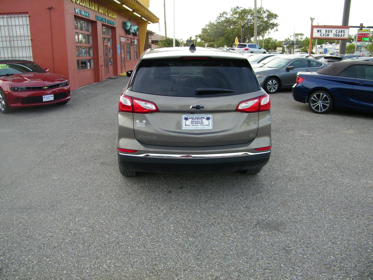 2019 Brown /Beige Chevrolet Equinox LT 2WD (3GNAXKEV2KS) with an 1.5L L4 DIR DOHC 16V TURBO engine, 6A transmission, located at 4000 Bee Ridge Road, Sarasota, FL, 34233, (941) 926-0300, 27.298664, -82.489151 - Photo#4