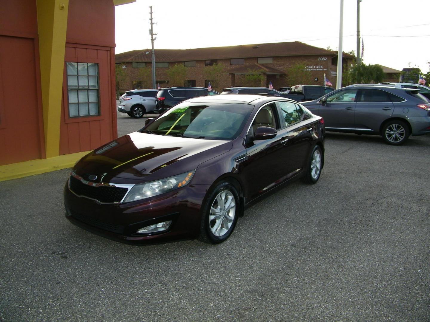 2013 Maroon /Beige Kia Optima EX (5XXGN4A77DG) with an 2.4L L4 DOHC 16V engine, 6-Speed Automatic transmission, located at 4000 Bee Ridge Road, Sarasota, FL, 34233, (941) 926-0300, 27.298664, -82.489151 - Photo#0