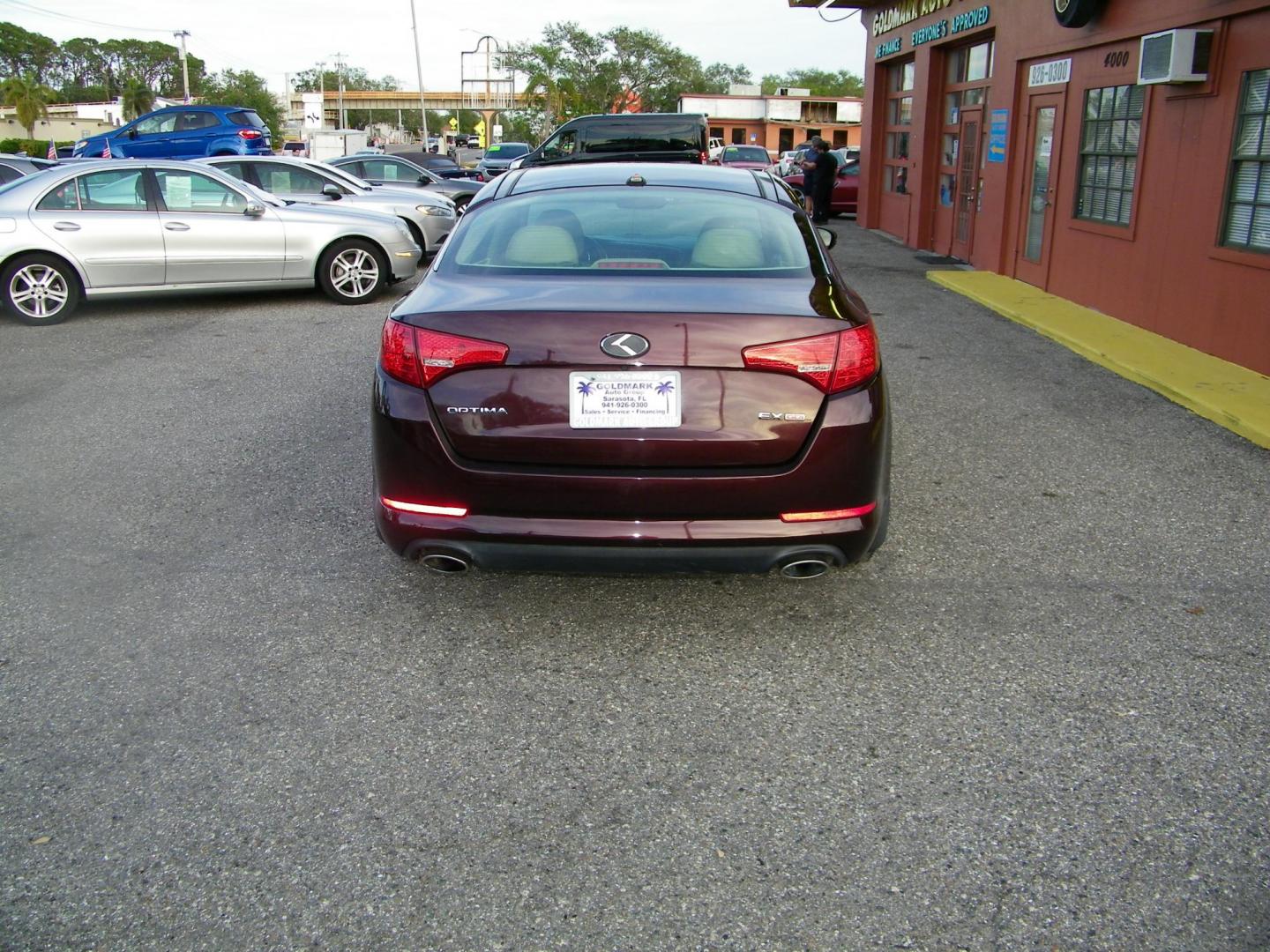 2013 Maroon /Beige Kia Optima EX (5XXGN4A77DG) with an 2.4L L4 DOHC 16V engine, 6-Speed Automatic transmission, located at 4000 Bee Ridge Road, Sarasota, FL, 34233, (941) 926-0300, 27.298664, -82.489151 - Photo#2