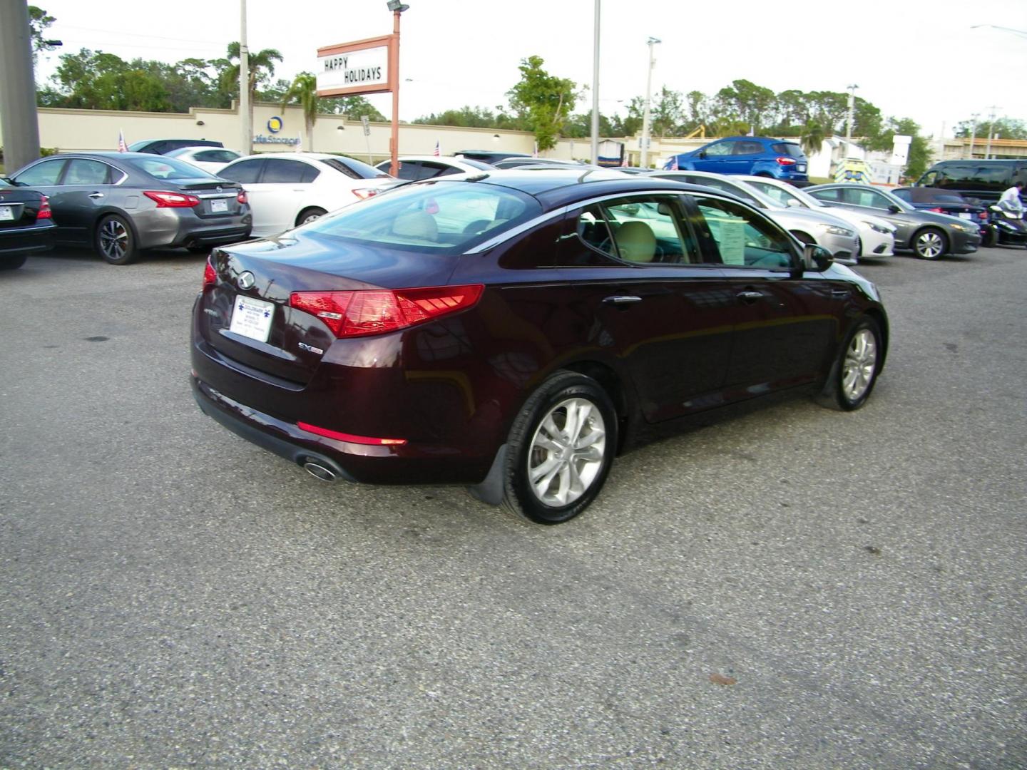 2013 Maroon /Beige Kia Optima EX (5XXGN4A77DG) with an 2.4L L4 DOHC 16V engine, 6-Speed Automatic transmission, located at 4000 Bee Ridge Road, Sarasota, FL, 34233, (941) 926-0300, 27.298664, -82.489151 - Photo#5