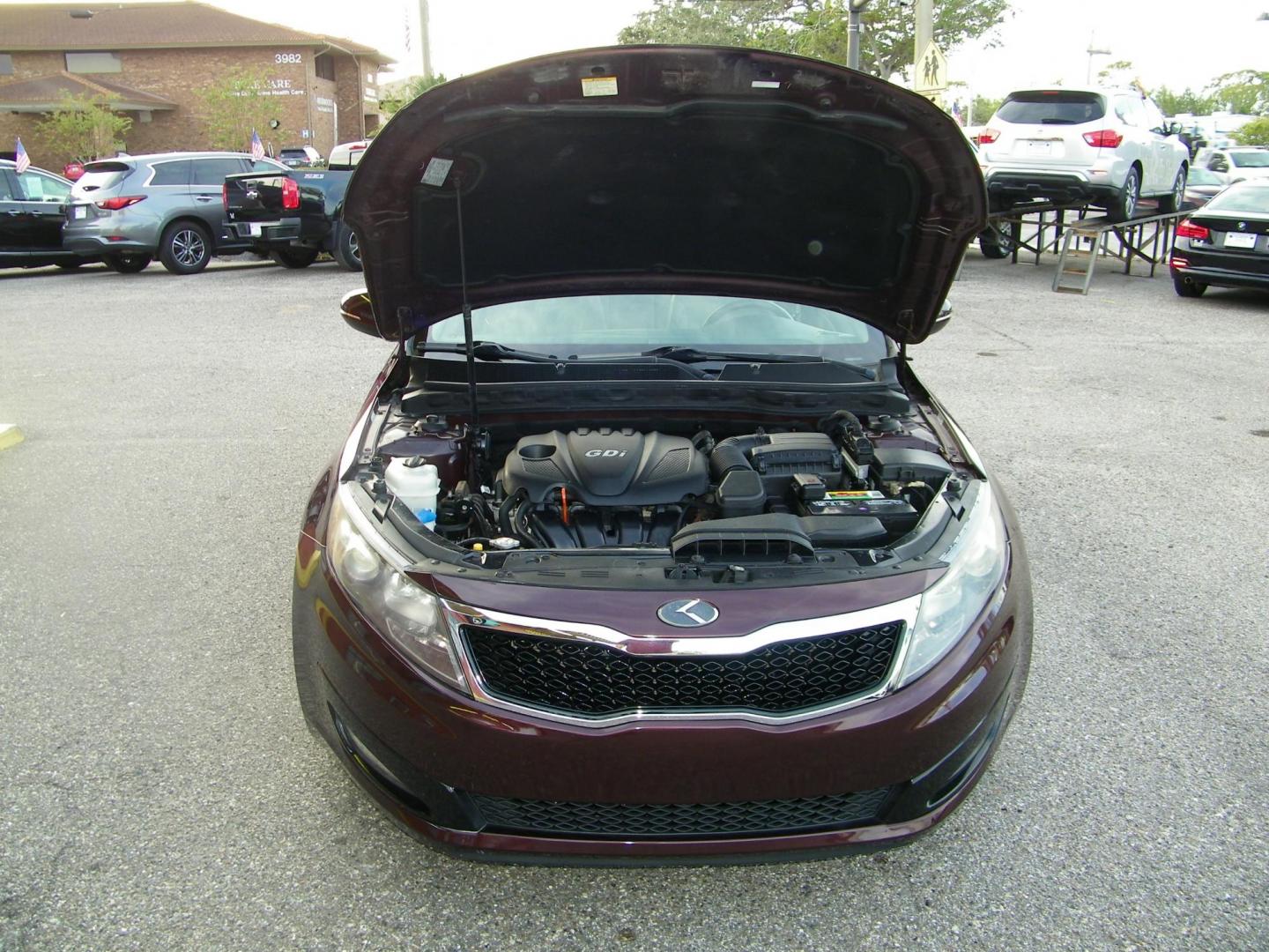 2013 Maroon /Beige Kia Optima EX (5XXGN4A77DG) with an 2.4L L4 DOHC 16V engine, 6-Speed Automatic transmission, located at 4000 Bee Ridge Road, Sarasota, FL, 34233, (941) 926-0300, 27.298664, -82.489151 - Photo#7