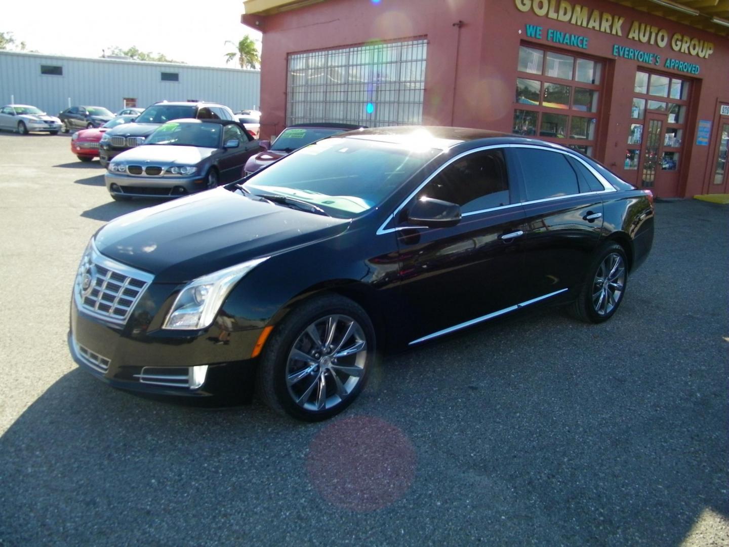 2013 Black /Black Cadillac XTS Luxury (2G61P5S33D9) with an 3.6L V6 DOHC 24V engine, 6-Speed Automatic transmission, located at 4000 Bee Ridge Road, Sarasota, FL, 34233, (941) 926-0300, 27.298664, -82.489151 - Photo#0