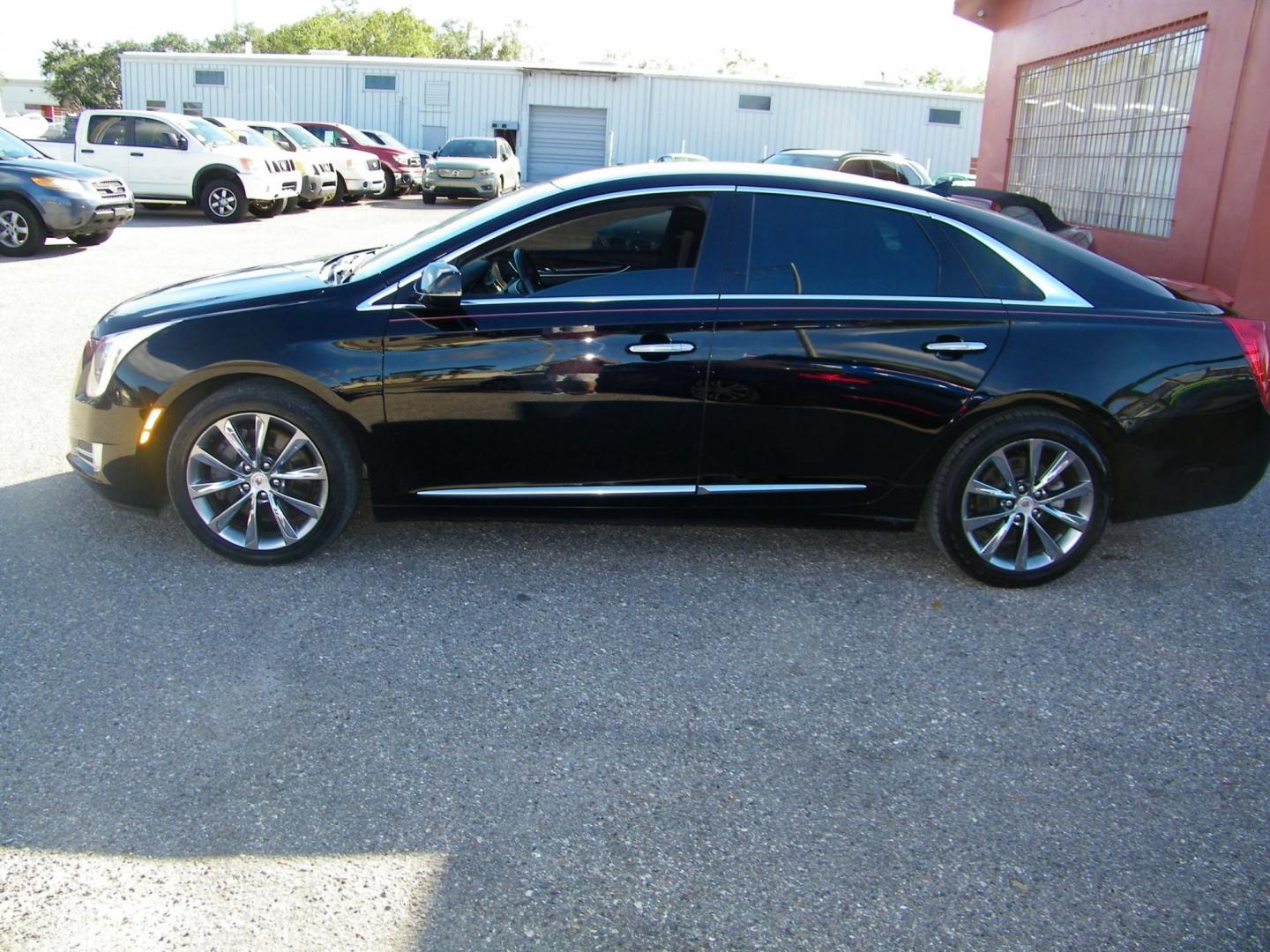 2013 Black /Black Cadillac XTS Luxury (2G61P5S33D9) with an 3.6L V6 DOHC 24V engine, 6-Speed Automatic transmission, located at 4000 Bee Ridge Road, Sarasota, FL, 34233, (941) 926-0300, 27.298664, -82.489151 - Photo#2