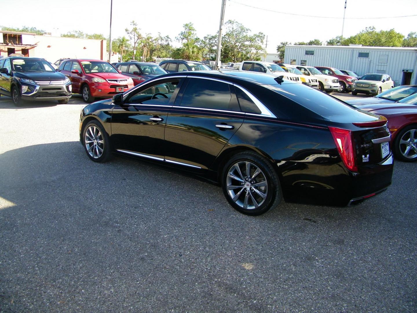 2013 Black /Black Cadillac XTS Luxury (2G61P5S33D9) with an 3.6L V6 DOHC 24V engine, 6-Speed Automatic transmission, located at 4000 Bee Ridge Road, Sarasota, FL, 34233, (941) 926-0300, 27.298664, -82.489151 - Photo#3