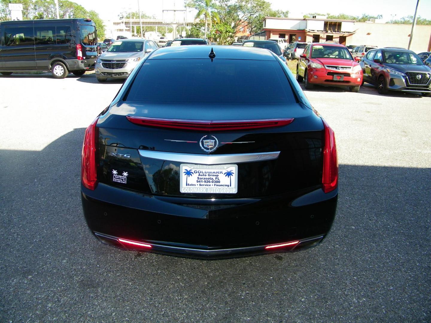 2013 Black /Black Cadillac XTS Luxury (2G61P5S33D9) with an 3.6L V6 DOHC 24V engine, 6-Speed Automatic transmission, located at 4000 Bee Ridge Road, Sarasota, FL, 34233, (941) 926-0300, 27.298664, -82.489151 - Photo#4