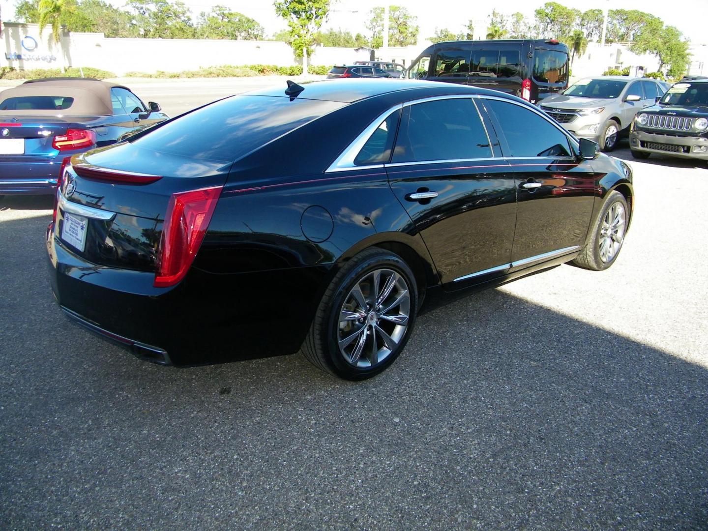 2013 Black /Black Cadillac XTS Luxury (2G61P5S33D9) with an 3.6L V6 DOHC 24V engine, 6-Speed Automatic transmission, located at 4000 Bee Ridge Road, Sarasota, FL, 34233, (941) 926-0300, 27.298664, -82.489151 - Photo#5