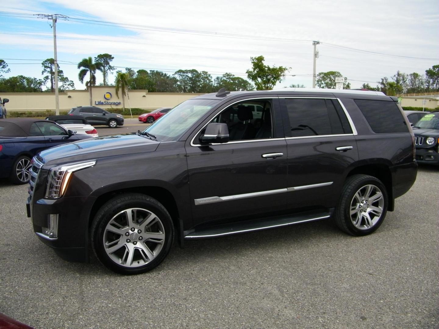 2015 Gray /Beige Cadillac Escalade Luxury 4WD (1GYS4MKJ6FR) with an 6.2L V8 OHV 16V FFV engine, 8-Speed Automatic transmission, located at 4000 Bee Ridge Road, Sarasota, FL, 34233, (941) 926-0300, 27.298664, -82.489151 - Photo#0