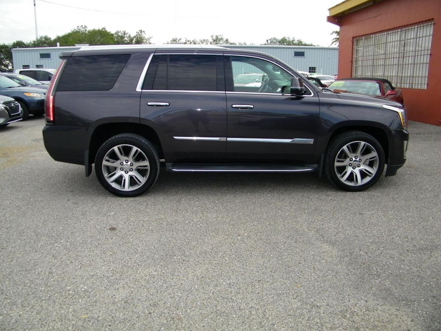 2015 Gray /Beige Cadillac Escalade Luxury 4WD (1GYS4MKJ6FR) with an 6.2L V8 OHV 16V FFV engine, 8-Speed Automatic transmission, located at 4000 Bee Ridge Road, Sarasota, FL, 34233, (941) 926-0300, 27.298664, -82.489151 - Photo#5